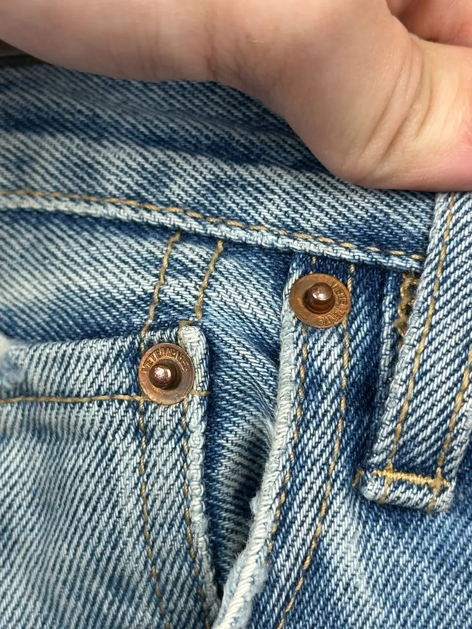 Vetements VETEMENTS FW19 Demna Anarchy Logo Distressed Blue Jeans, detail view 13