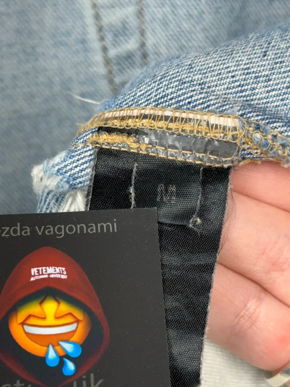 Vetements VETEMENTS FW19 Demna Anarchy Logo Distressed Blue Jeans, detail view 19