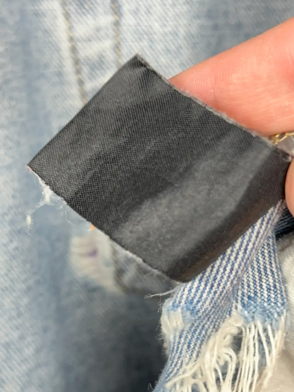 Vetements VETEMENTS FW19 Demna Anarchy Logo Distressed Blue Jeans, detail view 21