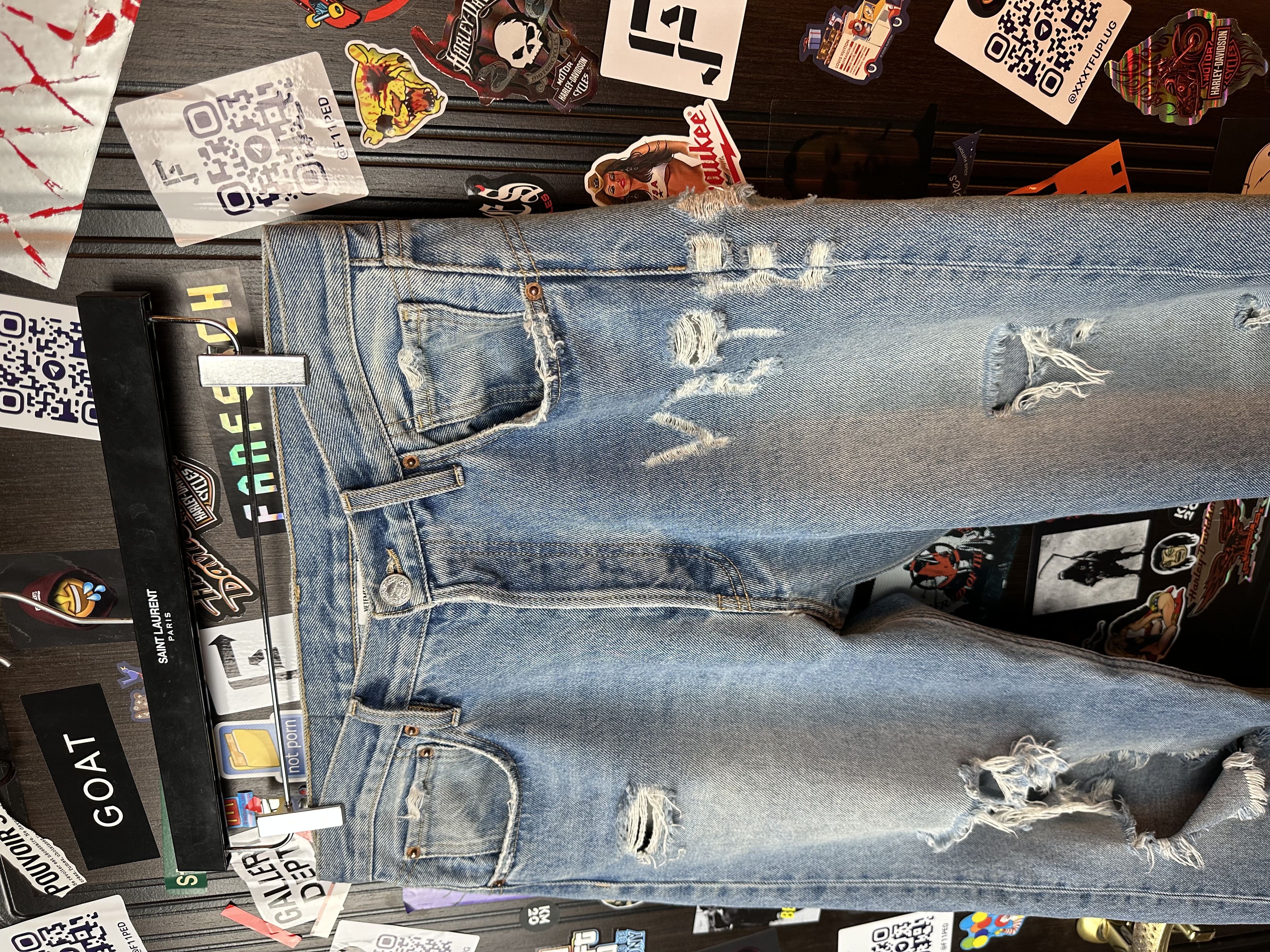 Vetements VETEMENTS FW19 Demna Anarchy Logo Distressed Blue Jeans, detail view 6