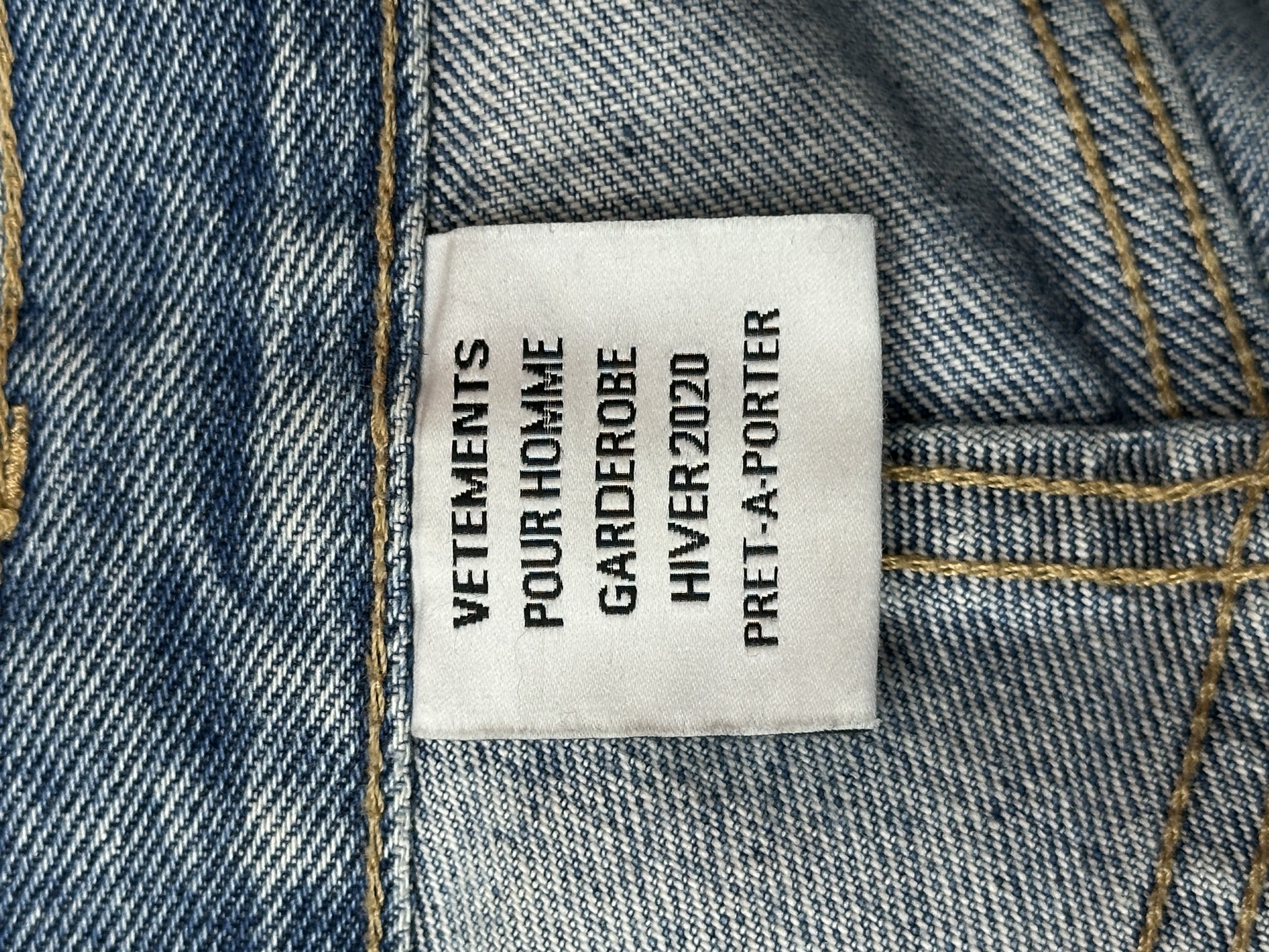 Vetements VETEMENTS FW19 Demna Anarchy Logo Distressed Blue Jeans, detail view 16