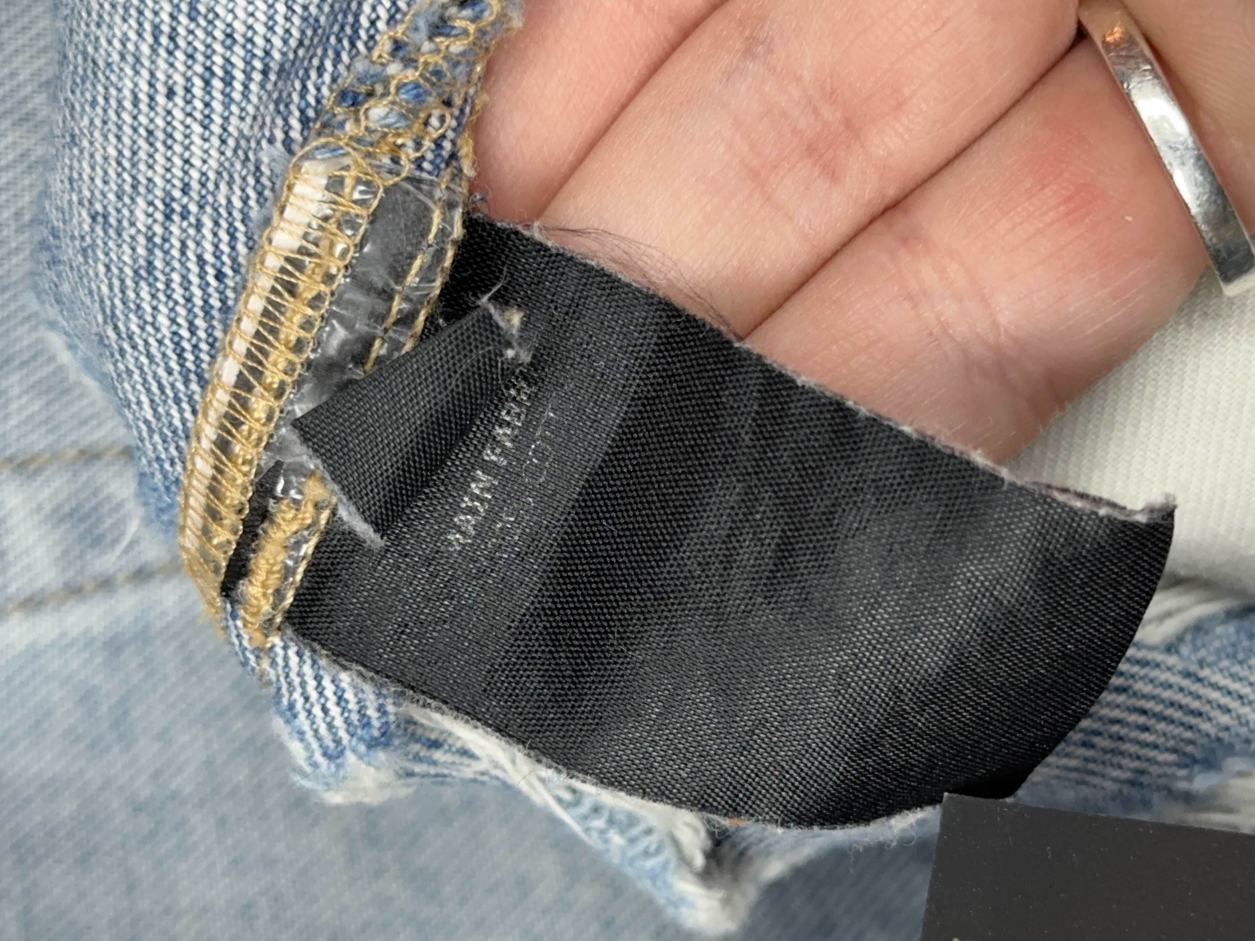Vetements VETEMENTS FW19 Demna Anarchy Logo Distressed Blue Jeans, detail view 20