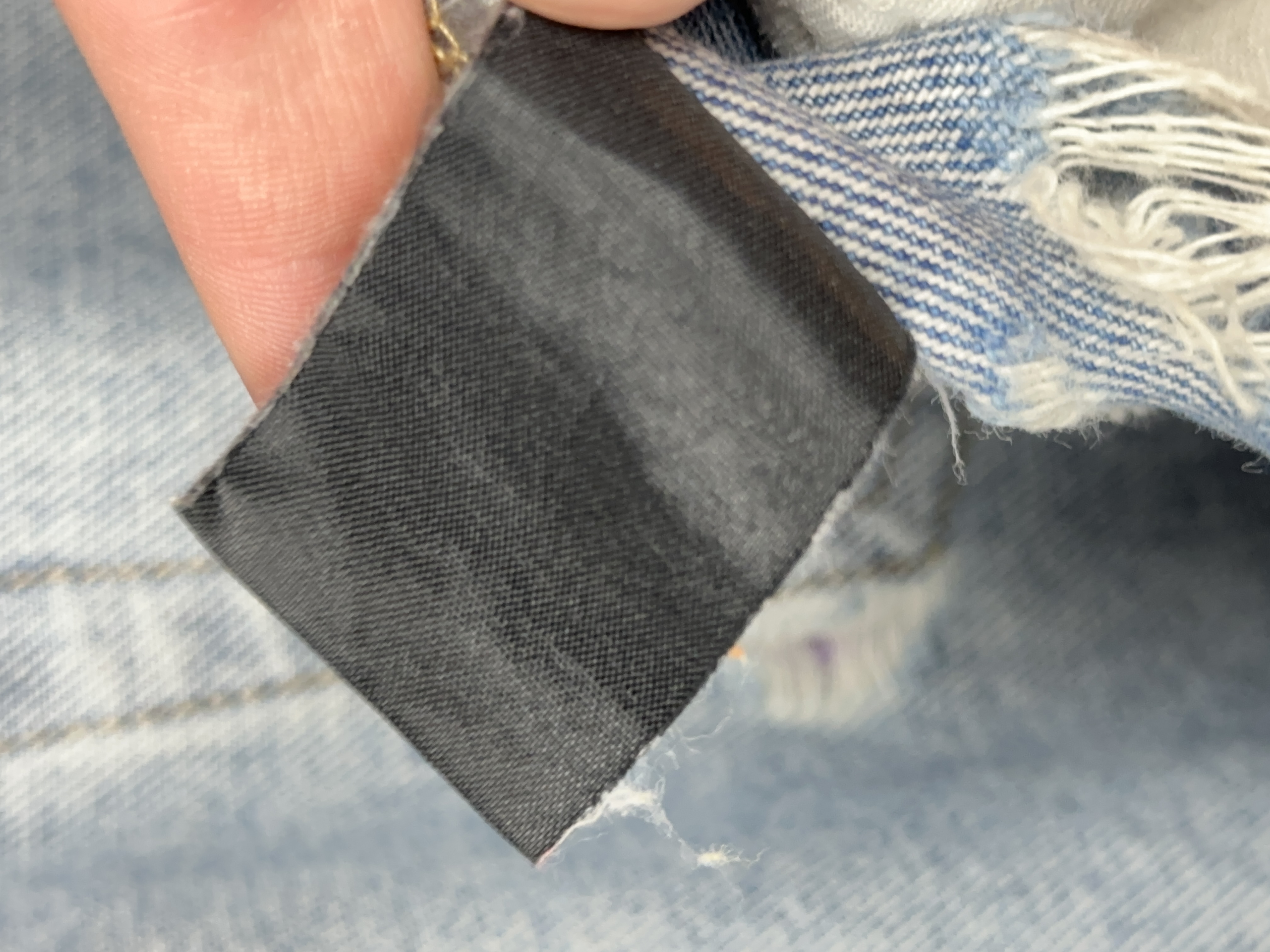 Vetements VETEMENTS FW19 Demna Anarchy Logo Distressed Blue Jeans, detail view 21